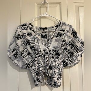 Women newsprint top